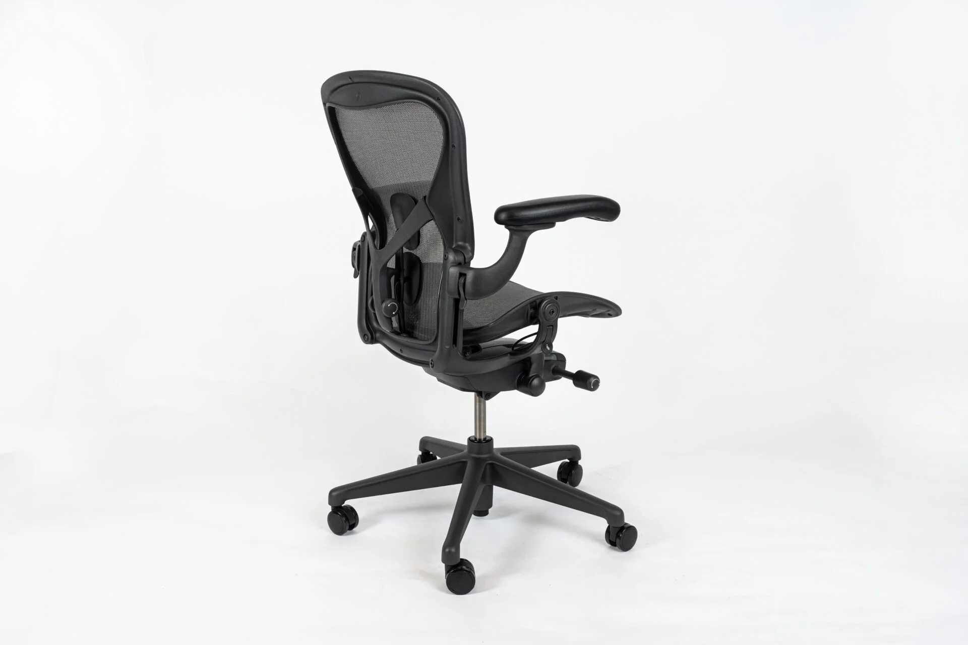 Herman Miller | Model: Aeron Remastered With Posture-Fit | Color: Graphite | Office Chair half side